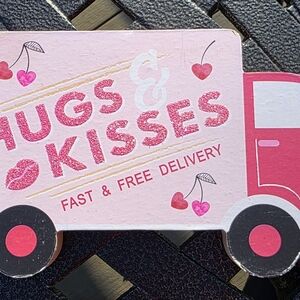 Pink Hugs & Kisses Sign Shaped As A Truck